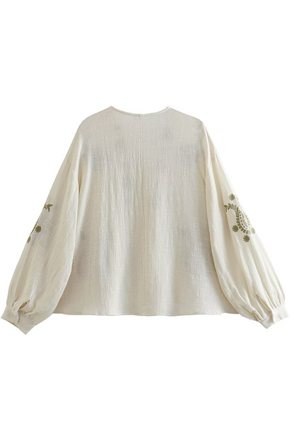 Blusas con cuello en V en contraste y flores bordadas