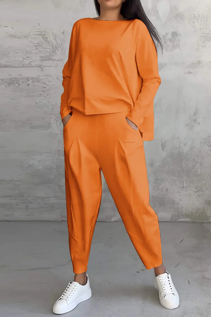 Conjunto informal de dos piezas con cuello redondo, manga larga y bolsillos en color liso (9 colores)