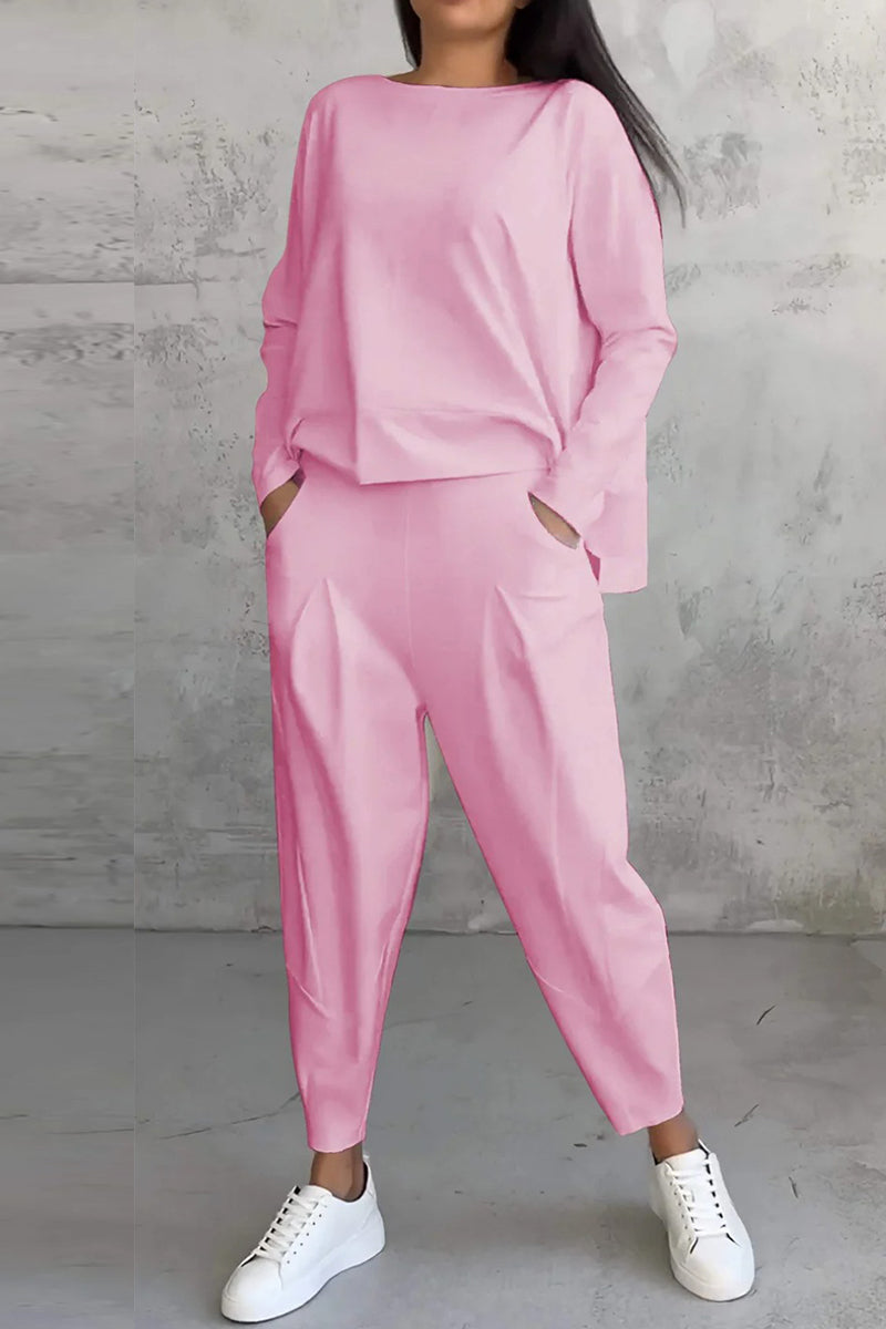 Conjunto informal de dos piezas con cuello redondo, manga larga y bolsillos en color liso (9 colores)