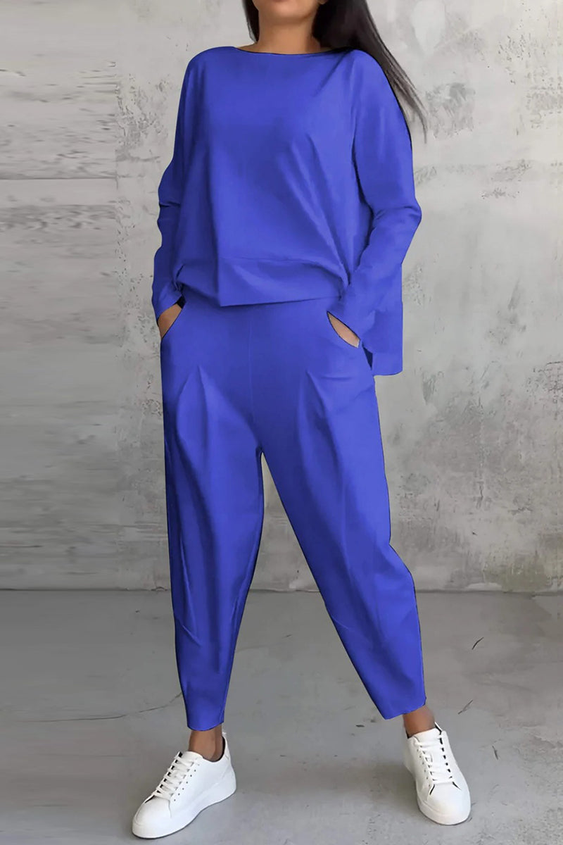 Conjunto informal de dos piezas con cuello redondo, manga larga y bolsillos en color liso (9 colores)