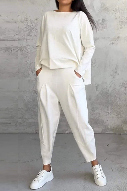 Conjunto informal de dos piezas con cuello redondo, manga larga y bolsillos en color liso (9 colores)