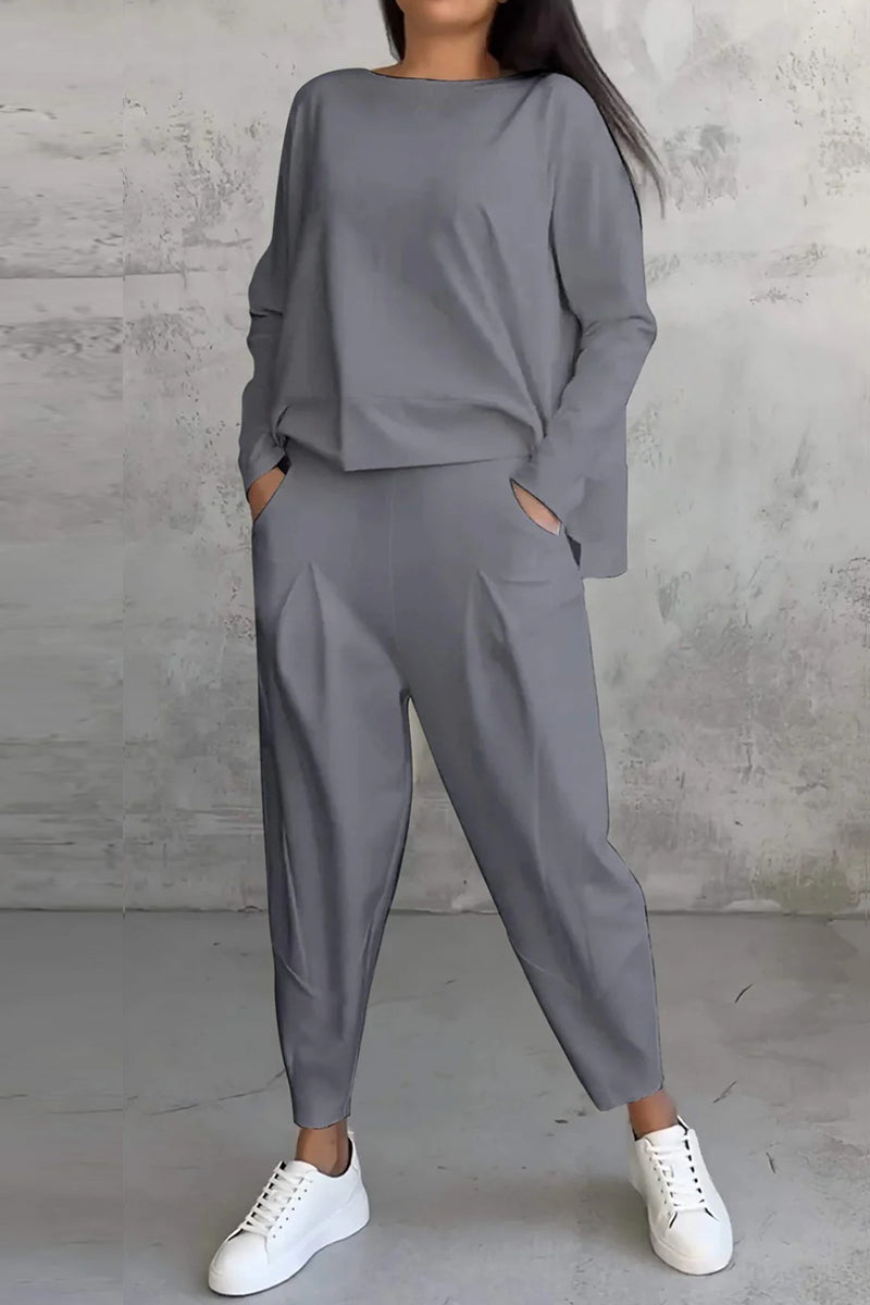 Conjunto informal de dos piezas con cuello redondo, manga larga y bolsillos en color liso (9 colores)