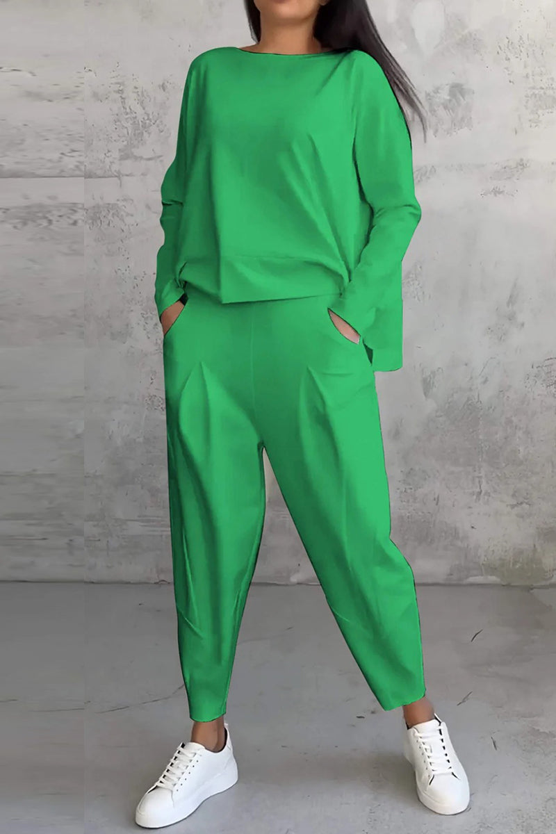 Conjunto informal de dos piezas con cuello redondo, manga larga y bolsillos en color liso (9 colores)