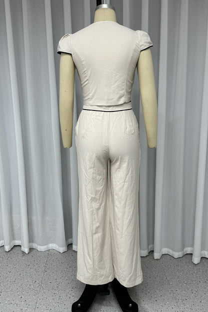 Conjunto informal de dos piezas con cuello en V, manga corta, botones y bolsillos de color liso