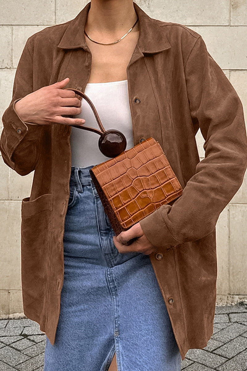 Prendas de abrigo informales de calle de color liso con bolsillos y botones y cuello vuelto