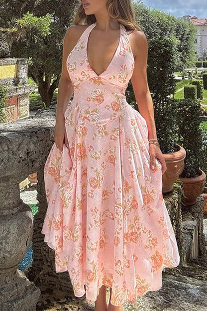 Vestidos sexis sin mangas y con cuello halter y espalda descubierta con flores para vacaciones
