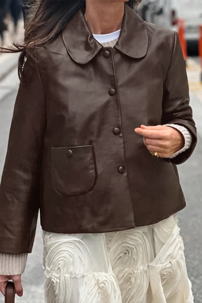 Prendas de abrigo con cuello vuelto, botones y bolsillos de color liso