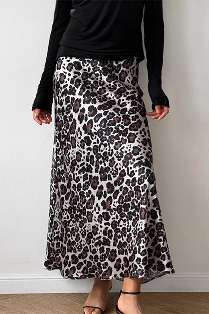 Elegante pantalón tipo A con cintura alta, estampado completo y cremallera de leopardo en contraste
