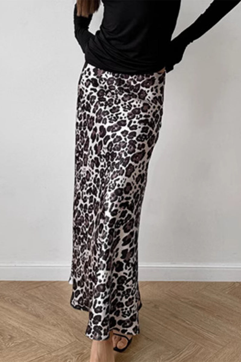 Elegante pantalón tipo A con cintura alta, estampado completo y cremallera de leopardo en contraste