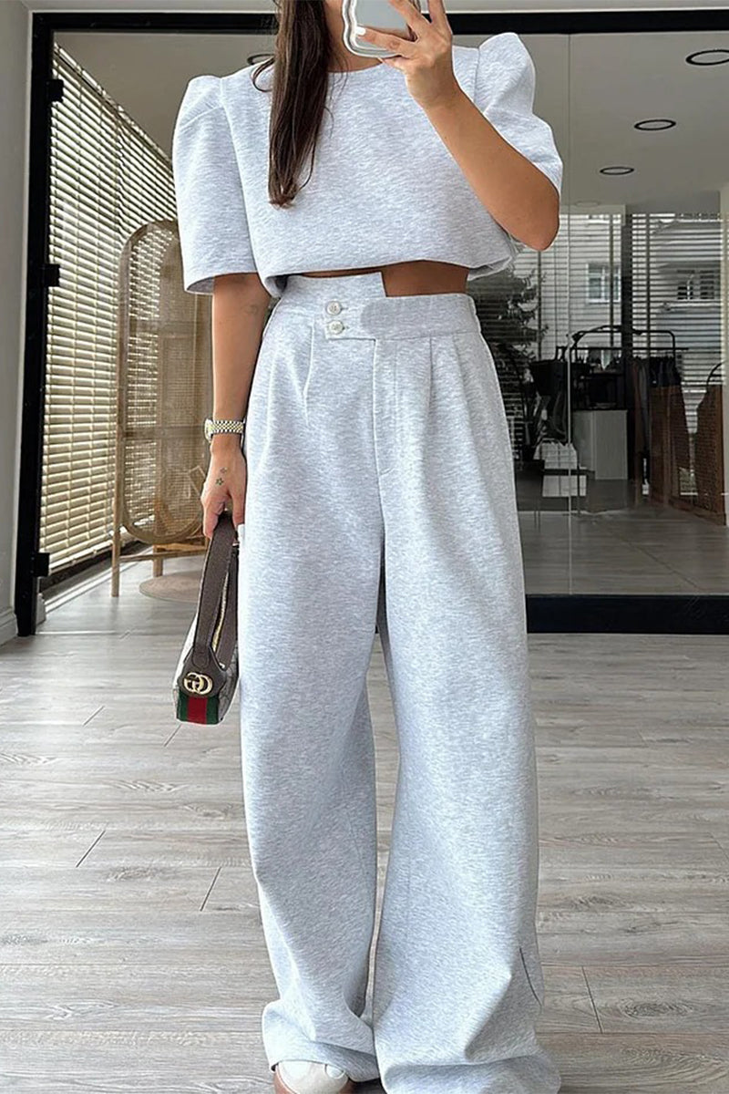 Conjunto informal de dos piezas con bolsillo, cuello redondo y manga corta