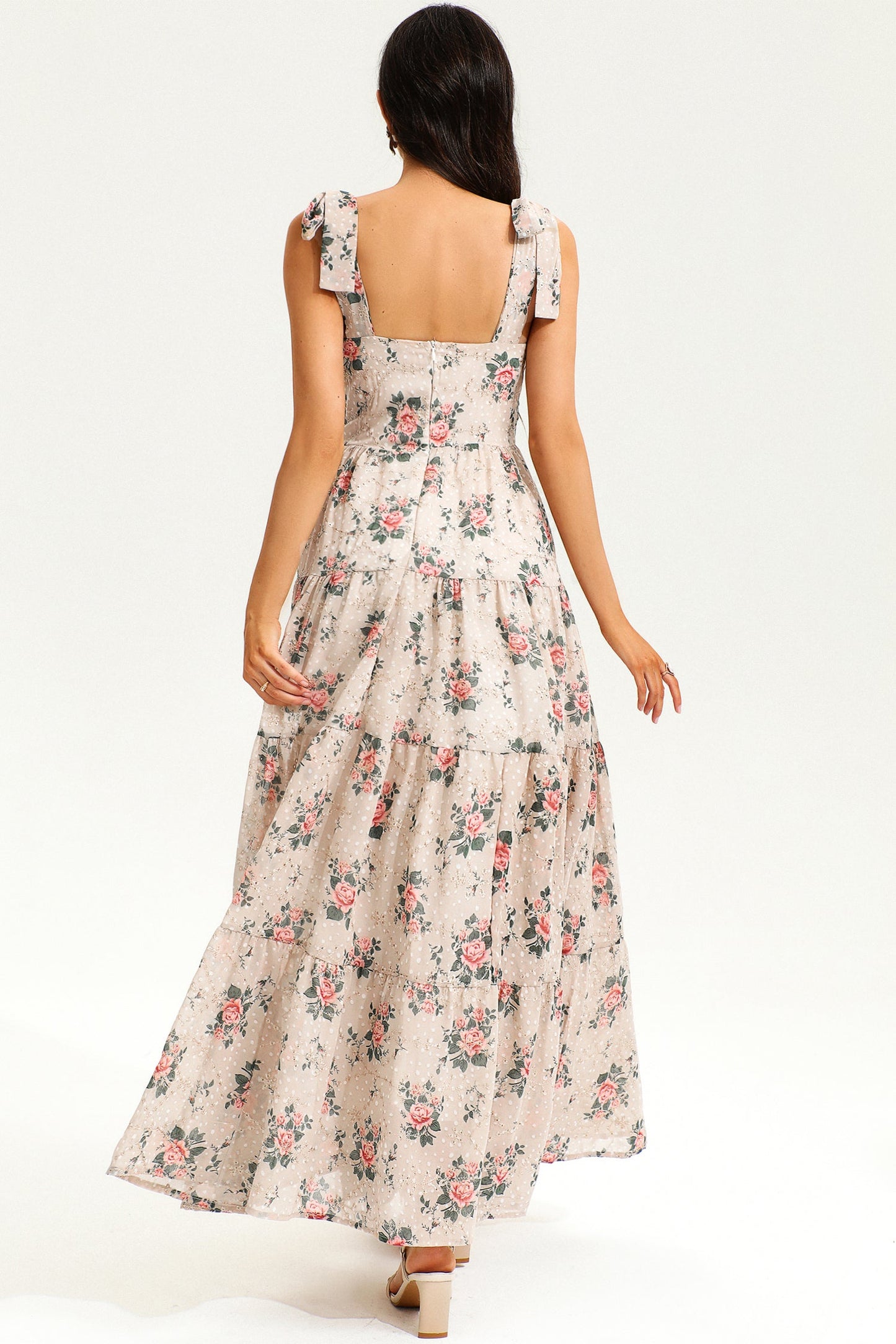 Vestido largo beige con encaje, espalda descubierta y corsé floral 