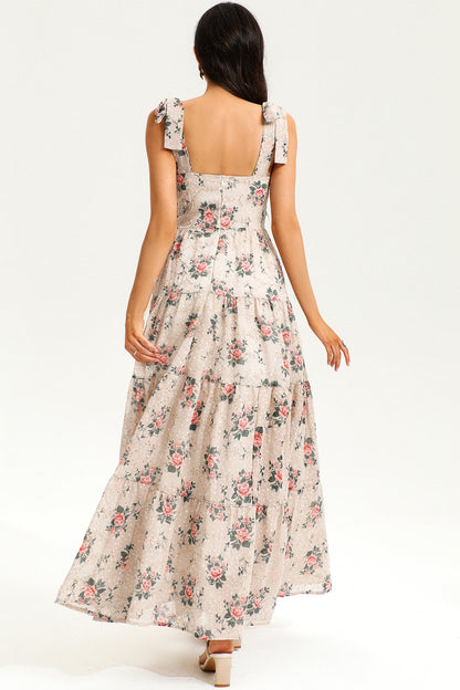 Vestido largo beige con encaje, espalda descubierta y corsé floral 