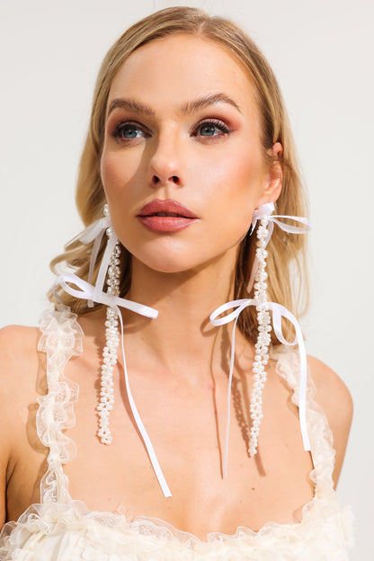 Pendientes de lazo con perlas de imitación 