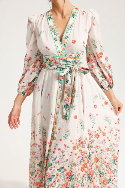 Vestido midi floral de manga larga con cuello en V y cordones 