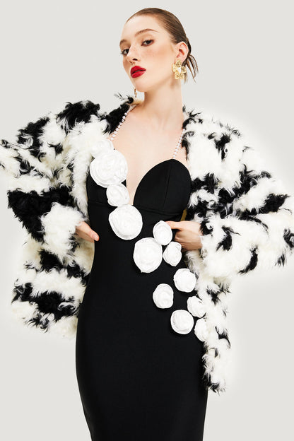 Abrigo con estampado de vaca y piel sintética de oveja 