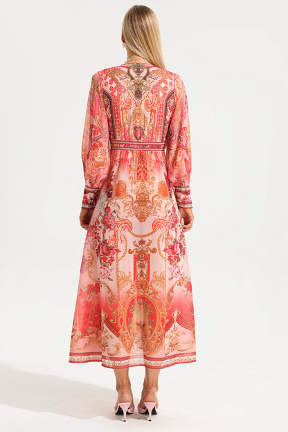 Vestido midi con cuello en V, mangas farol y estampado paisley 