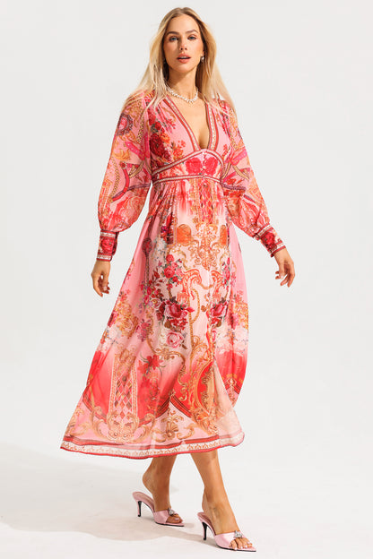 Vestido midi con cuello en V, mangas farol y estampado paisley 