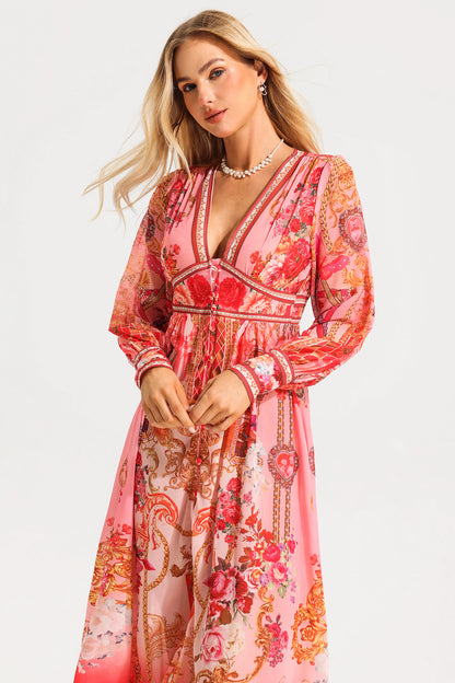 Vestido midi con cuello en V, mangas farol y estampado paisley 