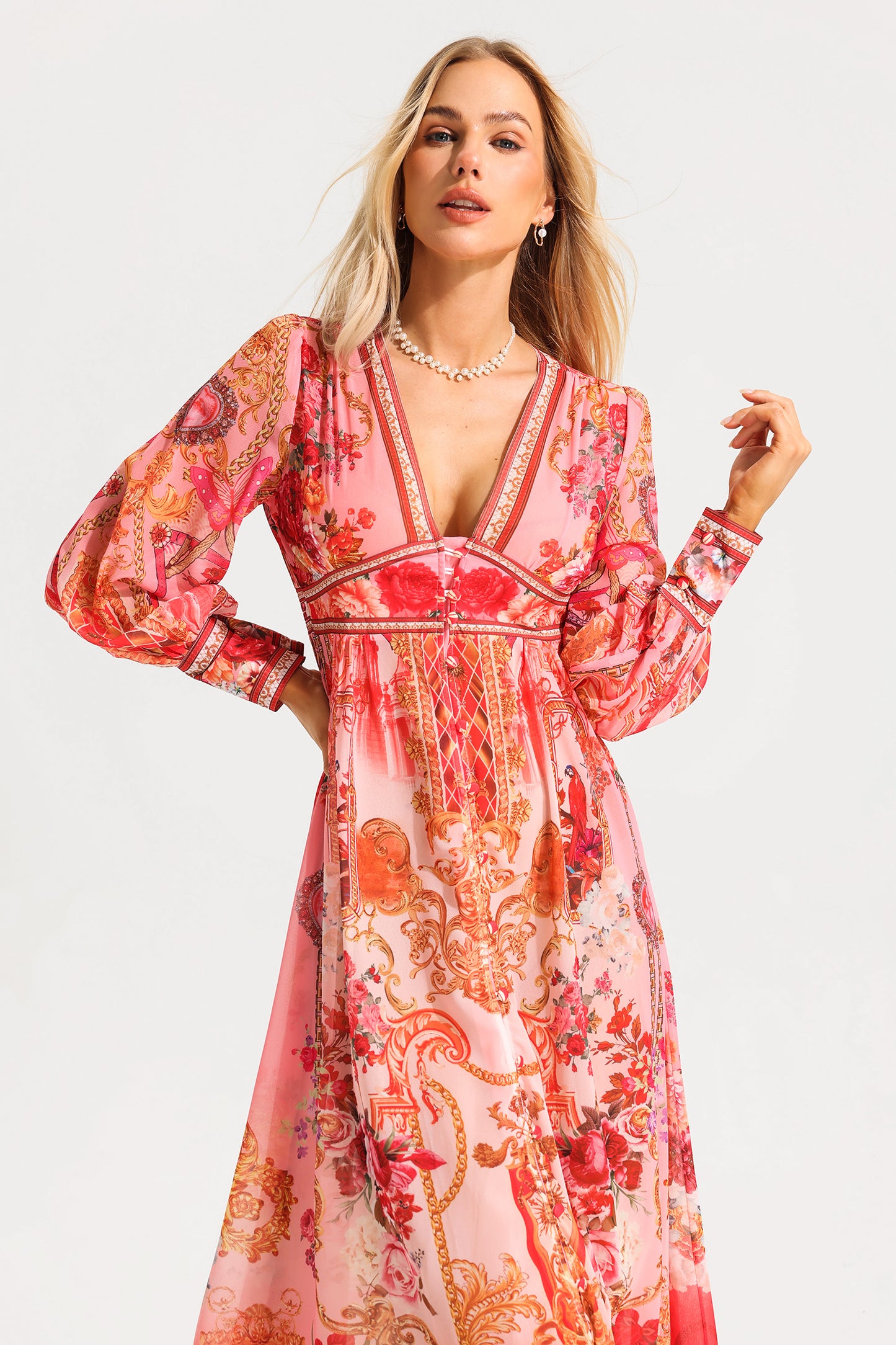 Vestido midi con cuello en V, mangas farol y estampado paisley 