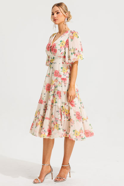 Vestido midi plisado con mangas abullonadas y estampado floral 
