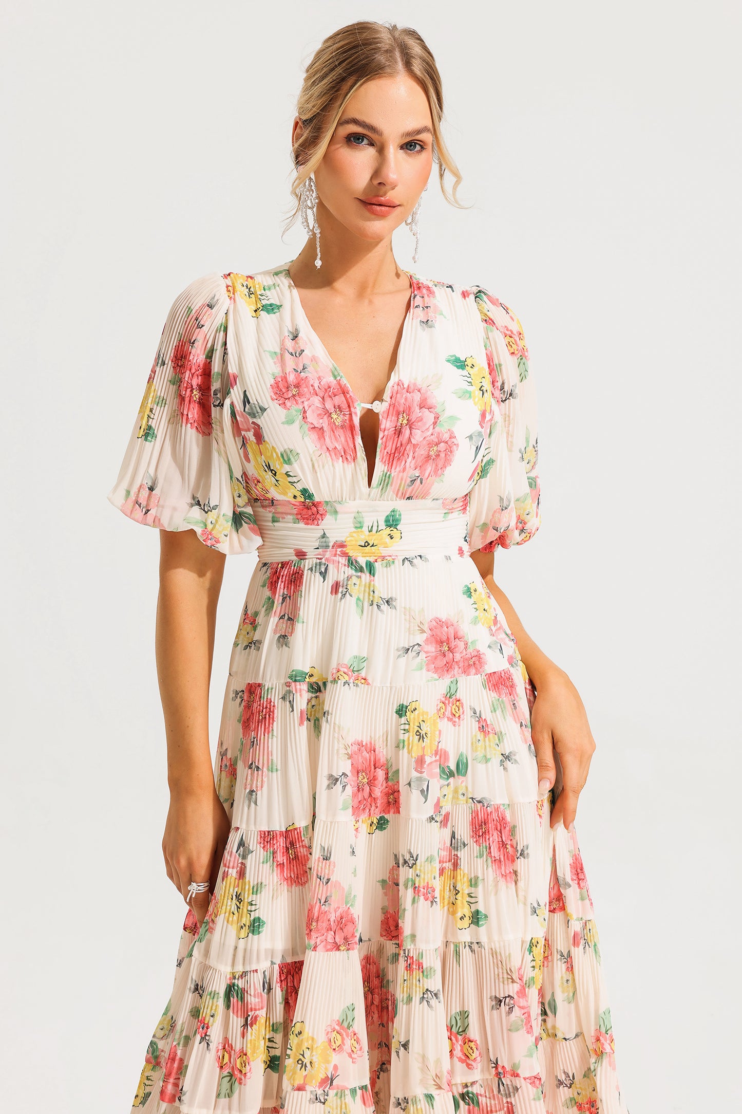 Vestido midi plisado con mangas abullonadas y estampado floral 