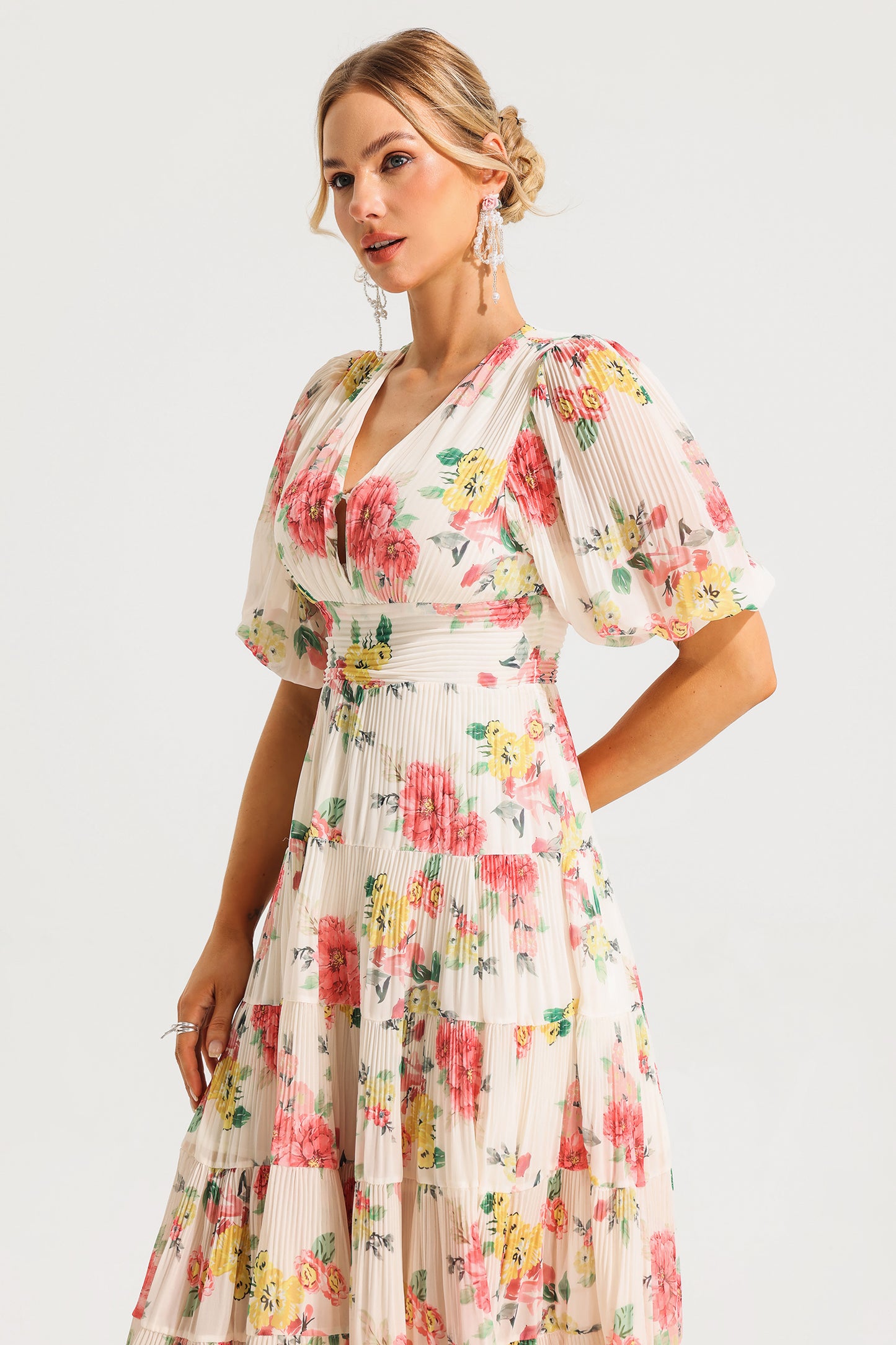 Vestido midi plisado con mangas abullonadas y estampado floral 
