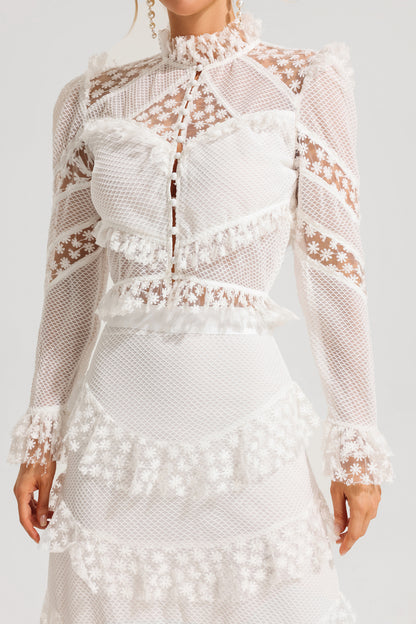 Conjunto de top con mangas abullonadas bordadas y falda larga de cintura media con volantes 