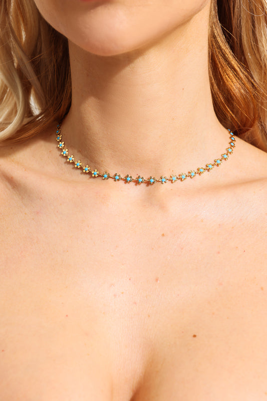 Conjunto de collar y pulsera de metal esmaltado con diseño floral 