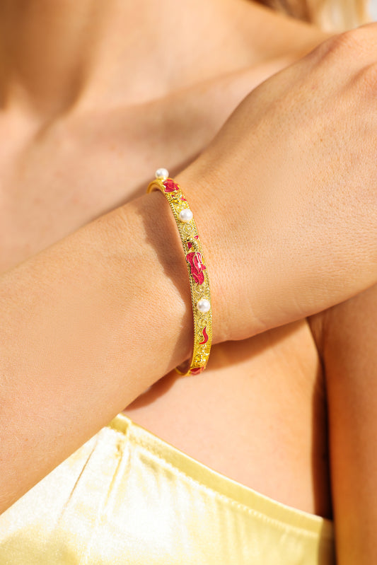 Pulsera de esmalte con perlas de imitación 