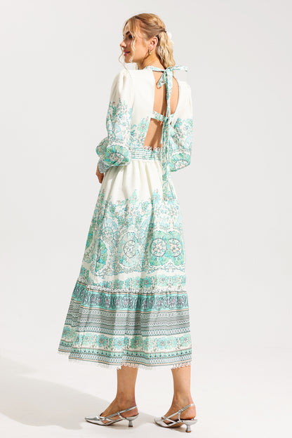 Vestido midi plisado con mangas farol y estampado floral 