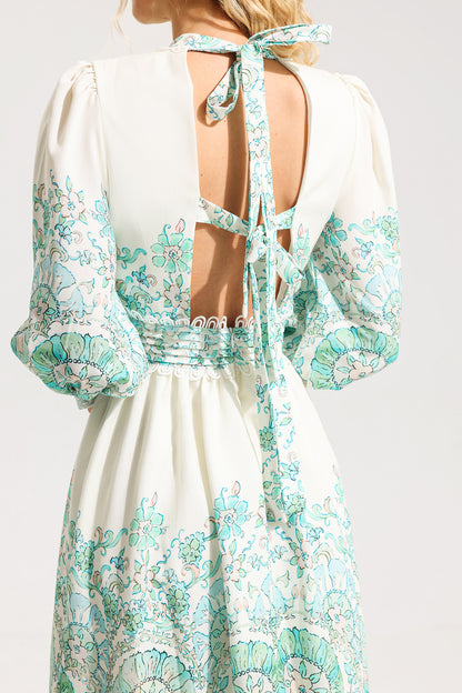 Vestido midi plisado con mangas farol y estampado floral 