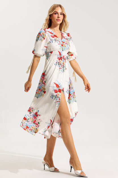 Vestido midi con mangas abullonadas y bajo floral 