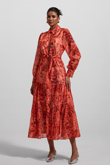 Vestido midi con mangas farol con estampado floral y bajo de metal con cinturón 