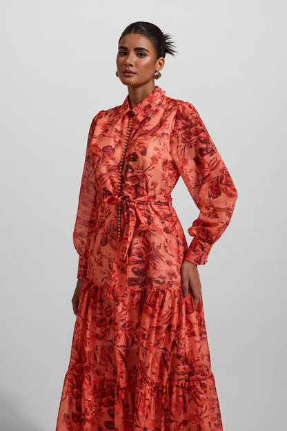 Vestido midi con mangas farol con estampado floral y bajo de metal con cinturón 