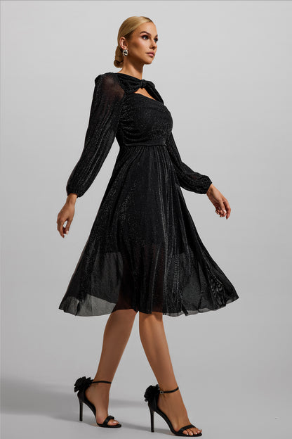 Vestido midi fruncido con mangas farol y nudo 