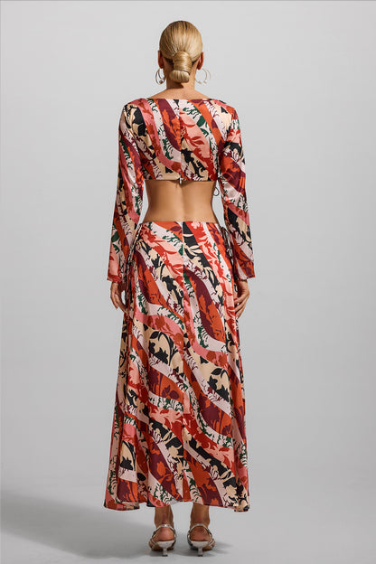 Vestido midi de manga larga con aberturas florales 