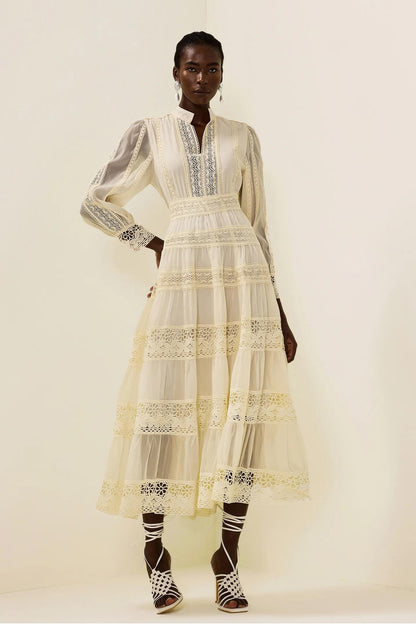 Vestido midi con mangas farol y bordado de encaje 