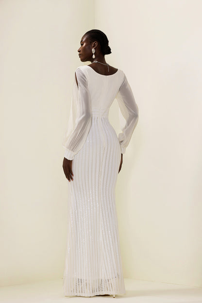 Vestido largo liso con lentejuelas y aberturas 