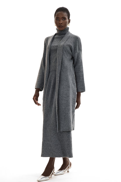 Conjunto de cárdigan de manga larga, top sin mangas de cuello alto y falda larga 