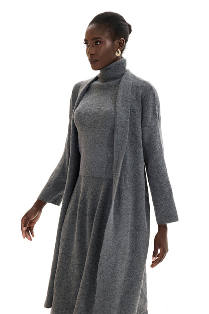 Conjunto de cárdigan de manga larga, top sin mangas de cuello alto y falda larga 