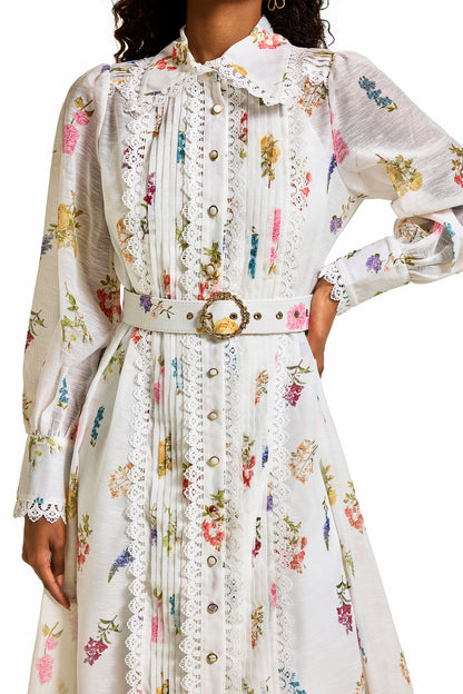 Vestido midi con mangas farol y encaje floral 