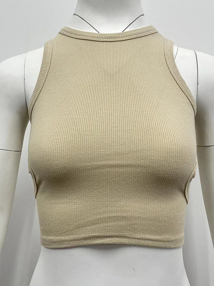 Camiseta sin mangas de color liso de verano 2025 para mujer, tops de punto con agujeros laterales, ropa básica de calle