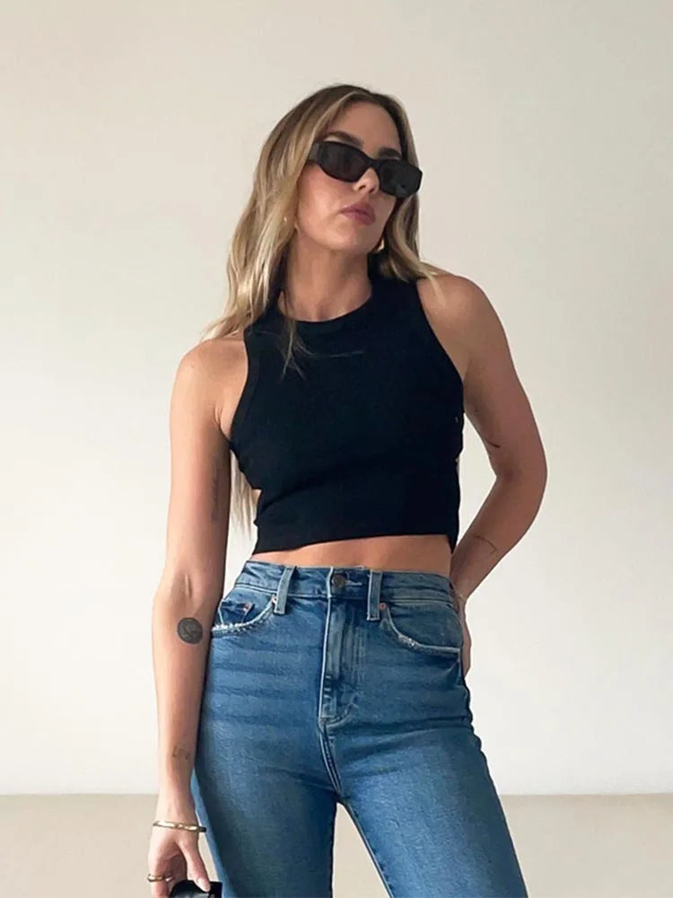 Camiseta sin mangas de color liso de verano 2025 para mujer, tops de punto con agujeros laterales, ropa básica de calle