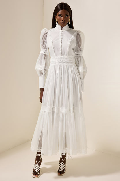 Vestido midi de encaje con mangas abullonadas y cuello alto 