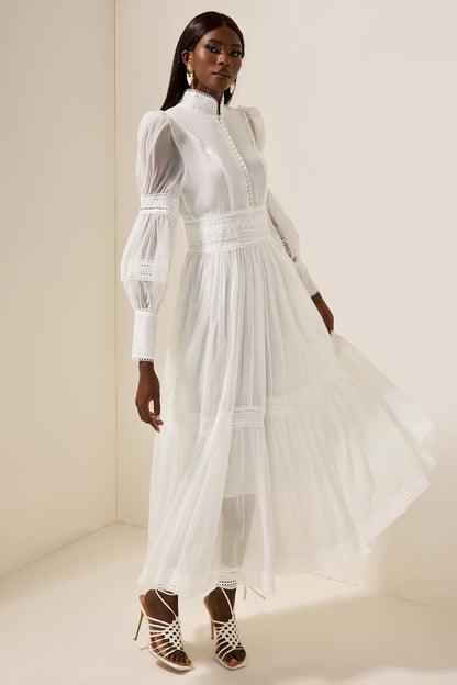Vestido midi de encaje con mangas abullonadas y cuello alto 