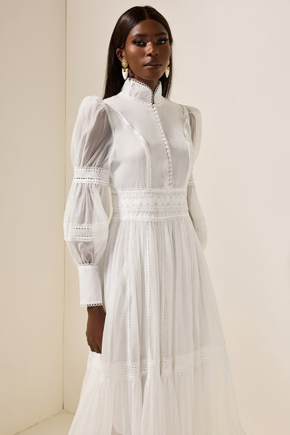 Vestido midi de encaje con mangas abullonadas y cuello alto 
