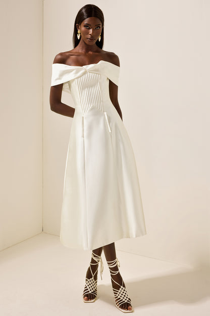 Vestido midi liso plisado con nudo 