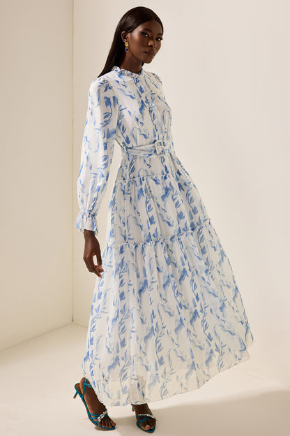 Vestido largo con mangas abullonadas y volantes florales con cinturón 