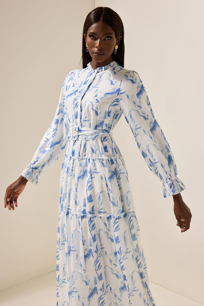 Vestido largo con mangas abullonadas y volantes florales con cinturón 