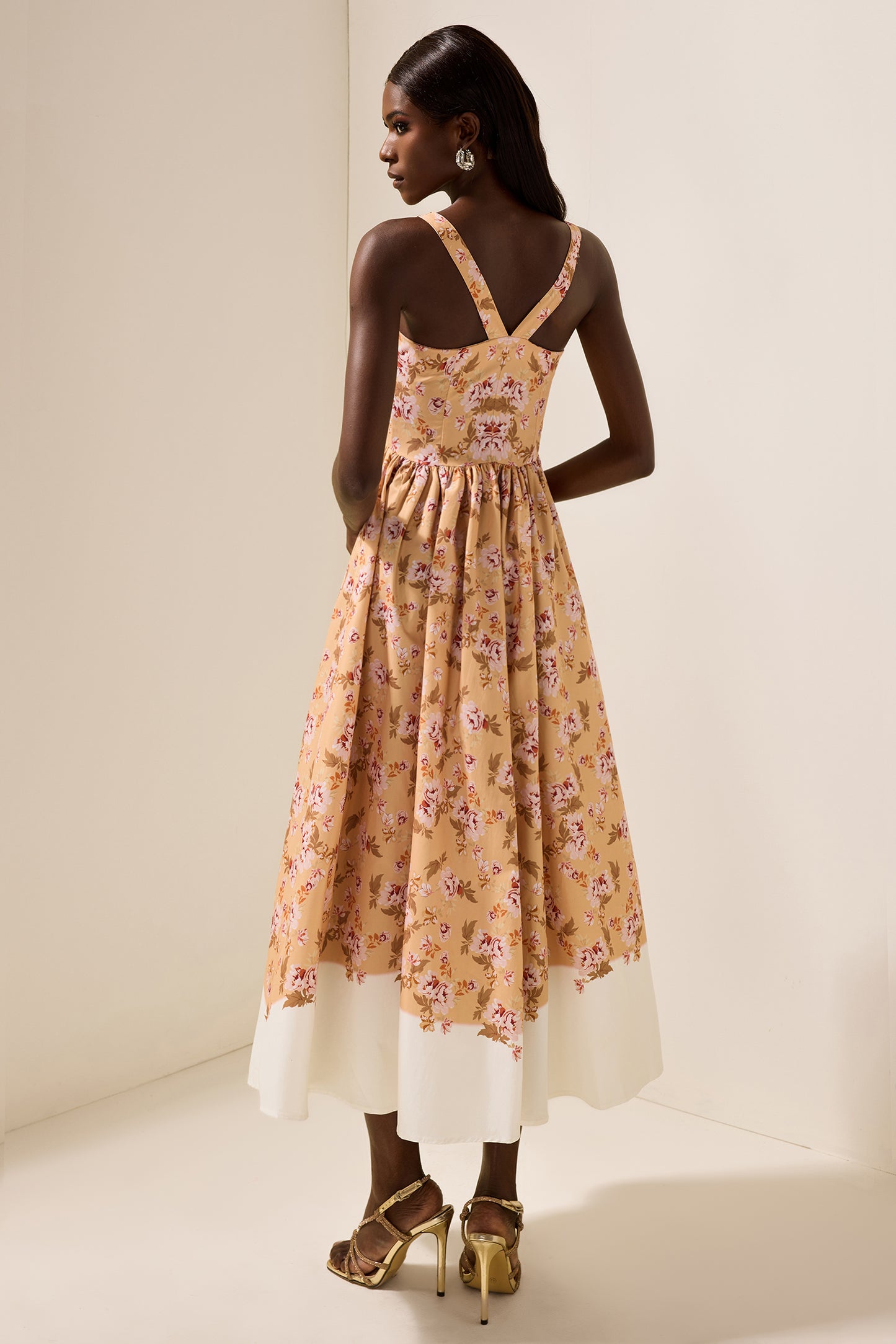 Vestido midi lencero sin mangas con estampado floral 